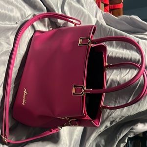 Pink Aimily purse. Like new condition.